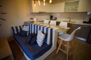 Apartment, Sea View (1 Double Bed + 2 Single Sofa Beds) | Living area | Flat-screen TV, pay movies, streaming services - Sandika Apartments (Hersonissos)