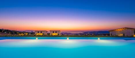 Outdoor pool, pool umbrellas, sun loungers