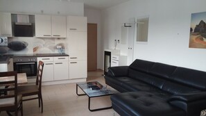 Apartment, 1 Bedroom | Living area | LED TV