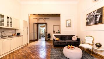 Apartment, 3 Bedrooms | Living area | 21-inch flat-screen TV with digital channels, TV