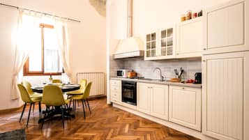 Apartment, 3 Bedrooms | Living area | 21-inch flat-screen TV with digital channels, TV