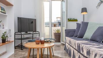 Comfort Apartment, 1 Bedroom | Living area | Flat-screen TV