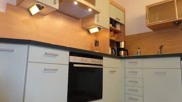 Apartment, 2 Bedrooms (incl. Cleaning Fee) | Private kitchen | Full-sized fridge, microwave, oven, stovetop