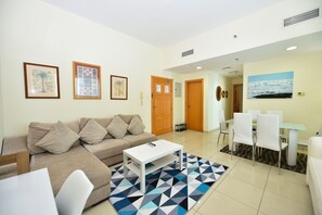 Apartment (Awad) | Living area | 43-inch TV with cable channels