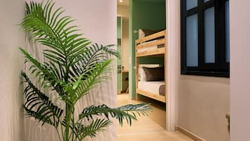 Exclusive Apartment, 4 Bedrooms | Living area | 40-inch flat-screen TV with cable channels, TV
