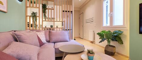 Exclusive Apartment, 4 Bedrooms | Living room | 40-inch flat-screen TV with cable channels, TV