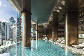 Outdoor pool, pool umbrellas, sun loungers