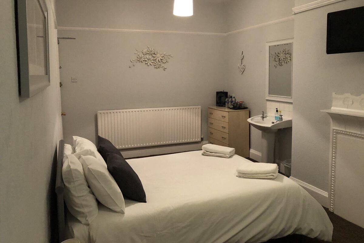Family Triple Room, 2 Bedrooms (Room 2) | Blackout drapes, iron/ironing board (on request), WiFi (free)