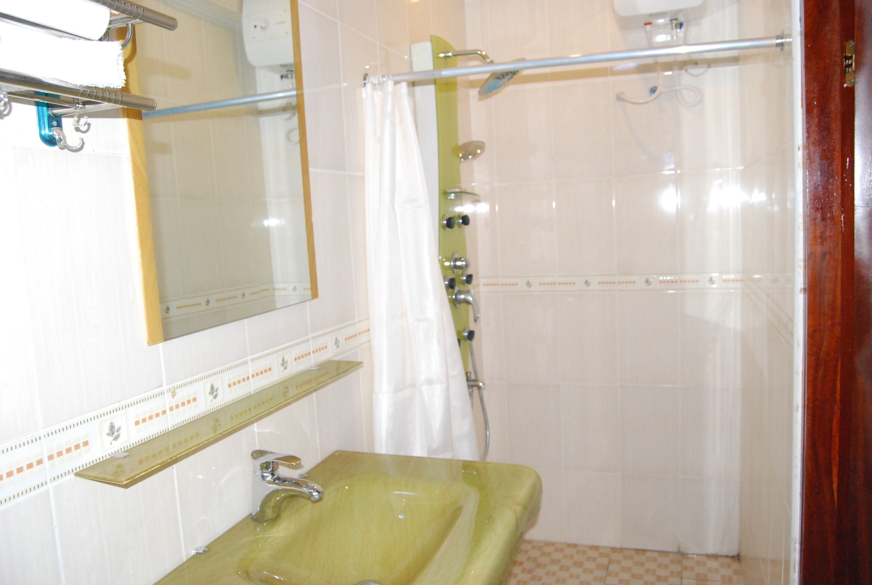 shower, free toiletries, slippers, towels