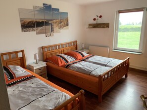 2 bedrooms, travel crib, WiFi, bed sheets