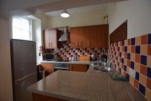 Appartement Ville | Cuisine privée | Grand réfrigérateur, micro-ondes, four, plaque de cuisson