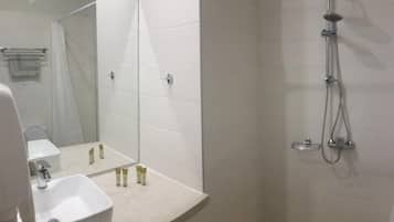 Shower, free toiletries, hair dryer, towels