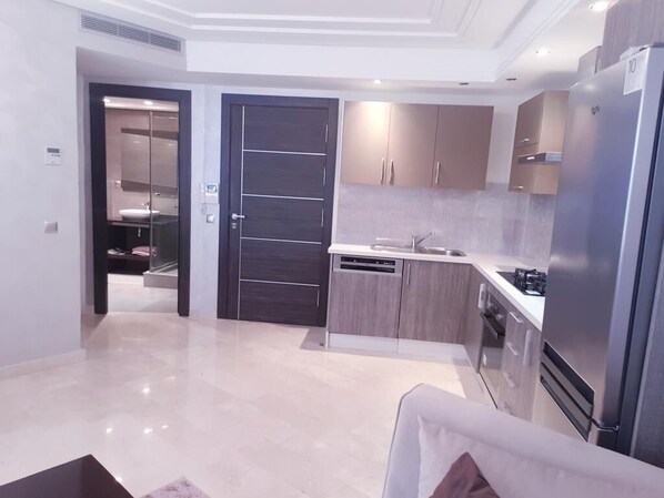 Departamento familiar, 1 habitación | Cocina privada | Refrigerador, microondas, horno y parrilla de estufa