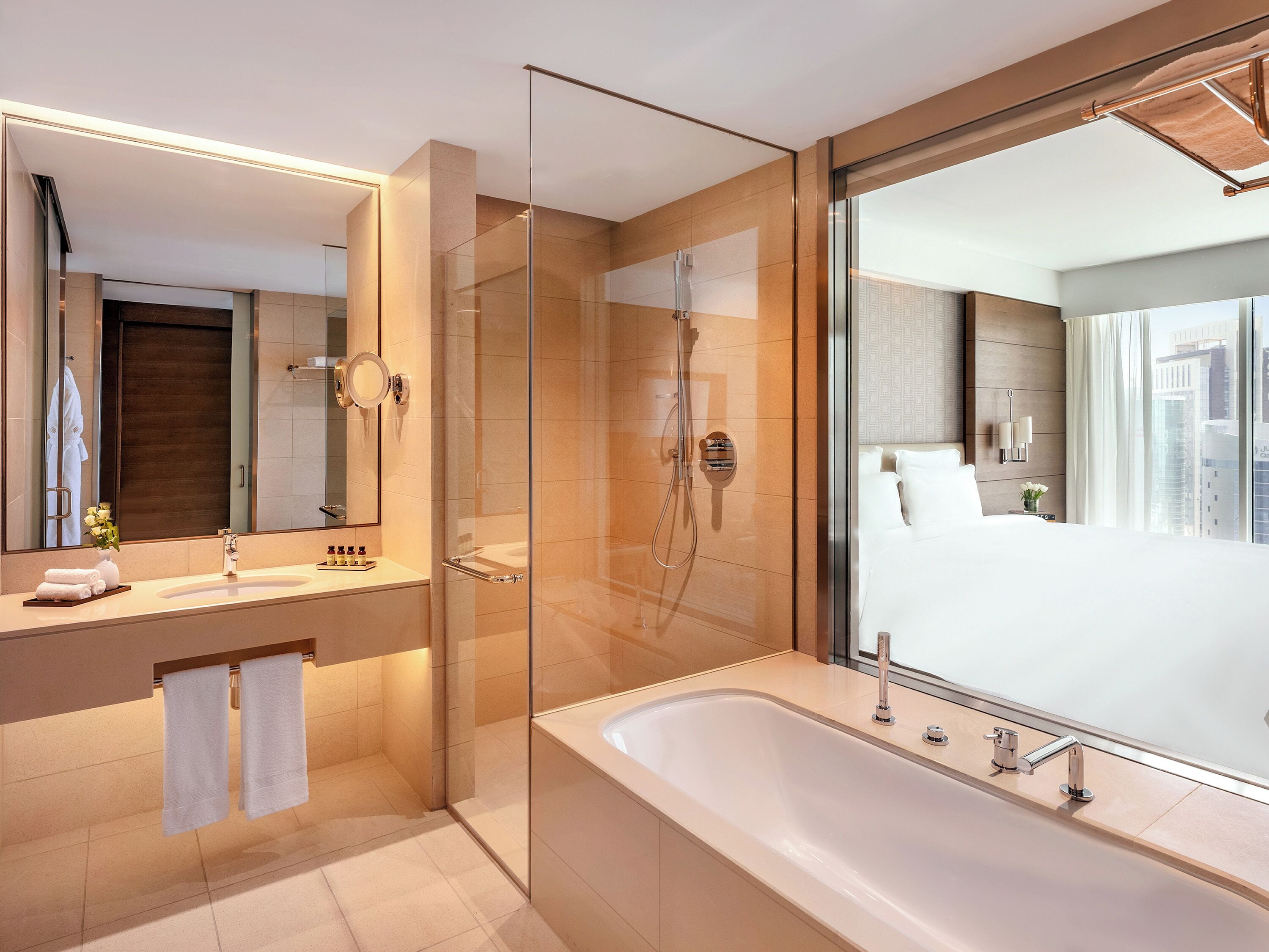 Separate bathtub and shower, rainfall showerhead, designer toiletries