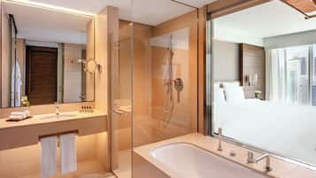 Separate bathtub and shower, rainfall showerhead, designer toiletries