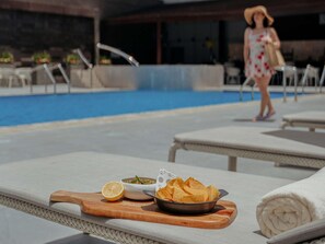 Outdoor pool, open 6:30 AM to 6:00 PM, pool umbrellas, pool loungers