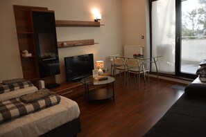 Apartemen Comfort, Beberapa Tempat Tidur, teras | 2 kamar tidur, setrika/meja setrika, Wi-Fi gratis, dan seprai linen