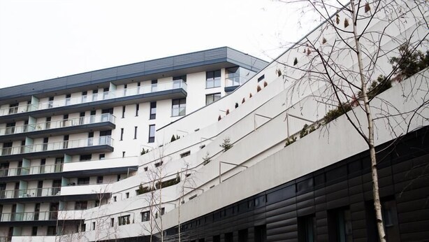 A modern multi-story building with balconies and large windows. - Labo Apartment Towarowa Kercelak (Warsaw)