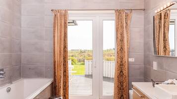 Separate bathtub and shower, deep-soaking bathtub, rainfall showerhead