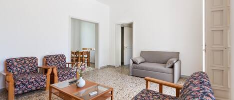 Standard Room, 2 Bedrooms (Piano Terra) | Living room | Flat-screen TV