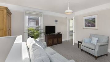 City Apartment, 1 Bedroom | Living room | Flat-screen TV, streaming services