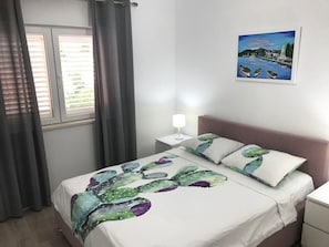 Appartement (4) | 2 chambres, couette en duvet d'oie, matelas mémoire de forme, bureau