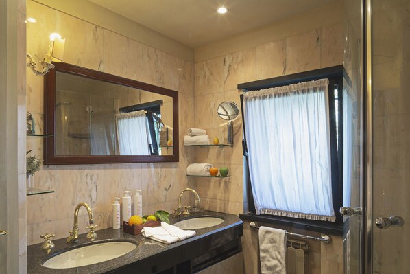 A bathroom with two sinks, a large mirror, a shower, and a window with curtains. - Villa San Massimo by Wonderful Italy (Rapallo)