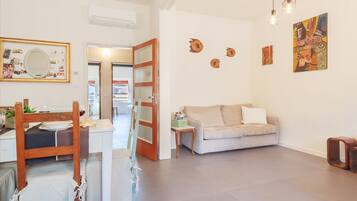 Apartment, 2 Bedrooms | Living area | Flat-screen TV
