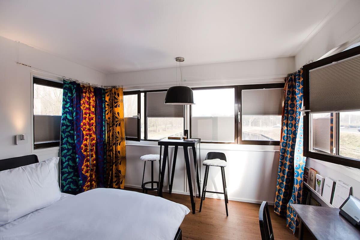 Apartment, 1 Double Bed, Canal View | 1 bedroom, in-room safe, individually decorated, individually furnished