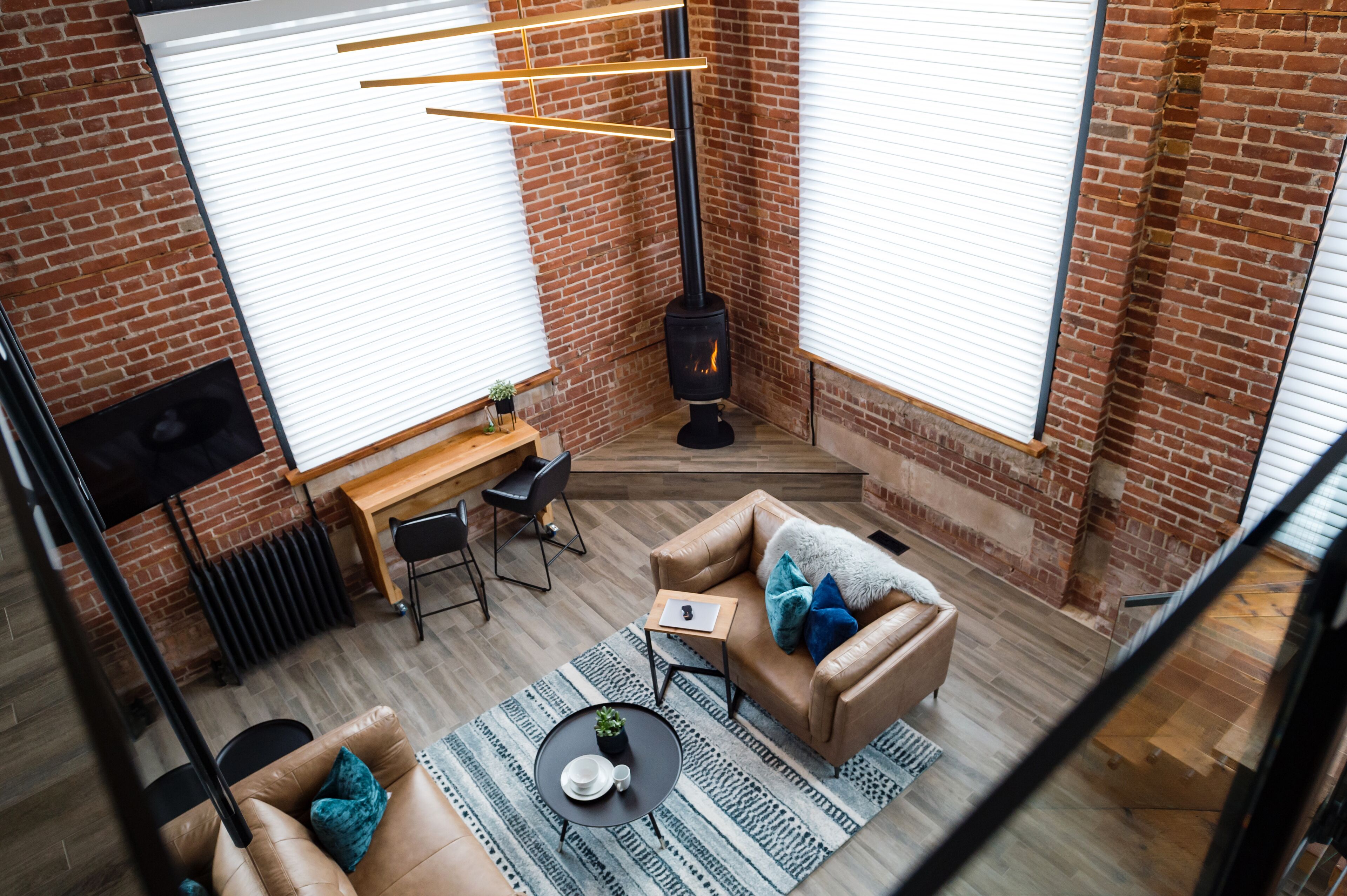 the metro suite | living area | 42-inch smart tv with digital channels, tv, fireplace