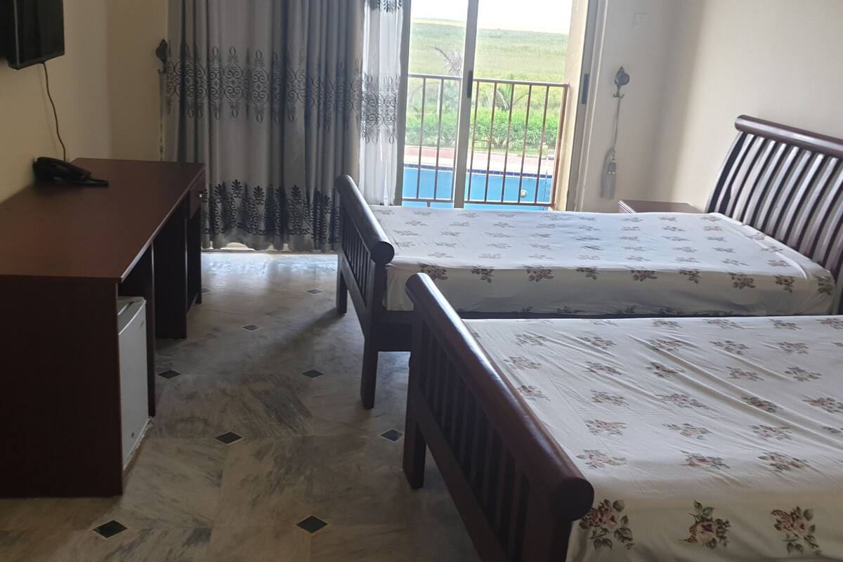 Minibar, desk, laptop workspace, blackout curtains