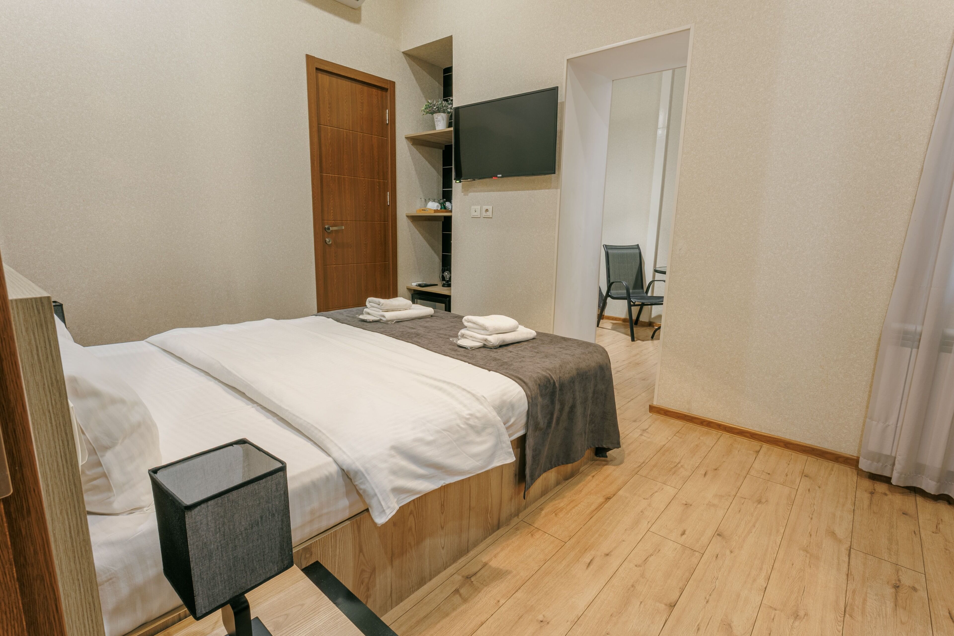 Comfort Quadruple Room, Courtyard View | Premium bedding, down duvets, memory-foam beds, iron/ironing board