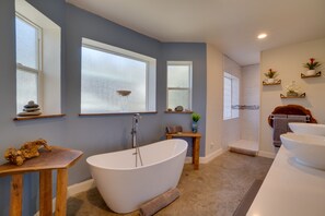 Combined shower/tub, hair dryer, towels, soap