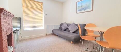 Apartment | Living area | 30-inch flat-screen TV with digital channels, TV