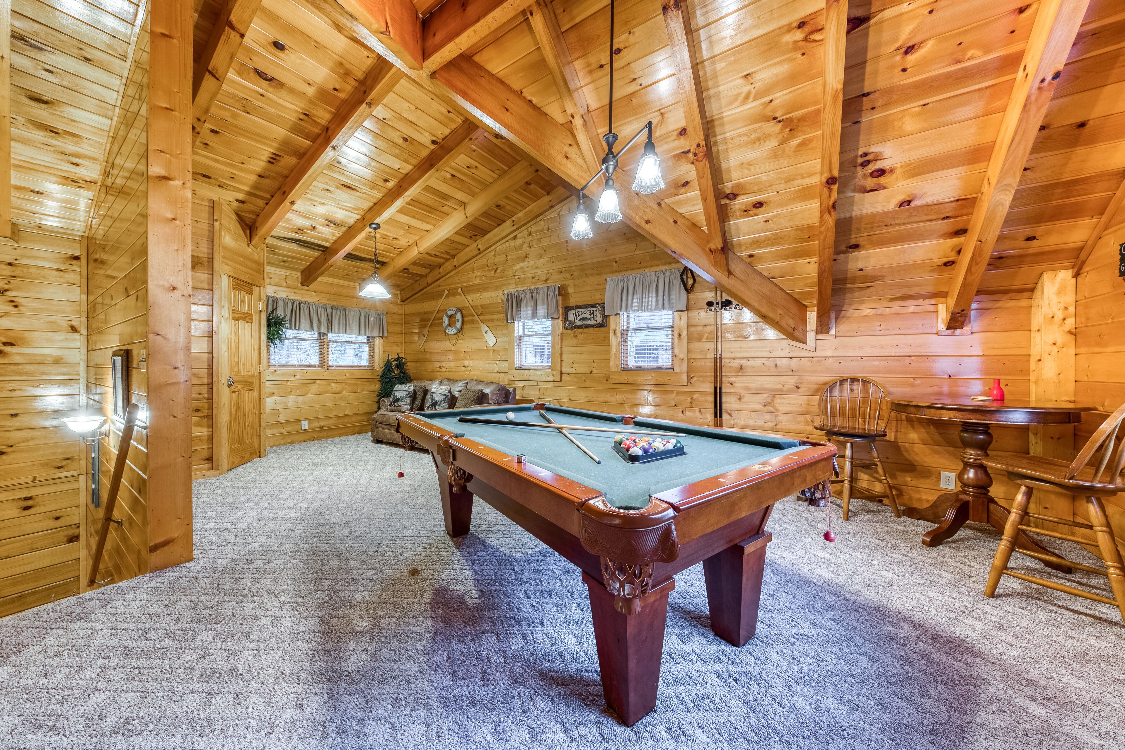 Peaceful wooded cabin w/ a private hot tub, backyard stream, & shared pool