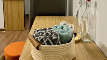 Fridge, microwave, cookware/dishes/utensils, cleaning supplies