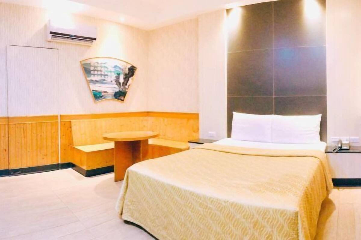 Down comforters, blackout drapes, WiFi (free), bed sheets