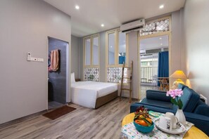Quarto família | Frigobar, escrivaninha, ferros/tábuas de passar roupa, Wi-Fi de cortesia