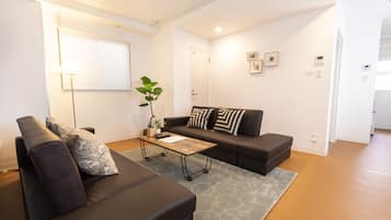 Apartment, 1F | Living area | Flat-screen TV, Netflix, DVD player, streaming services