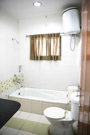Shower, hydromassage showerhead, towels, soap - Soumya Resorts (Mahasamund)