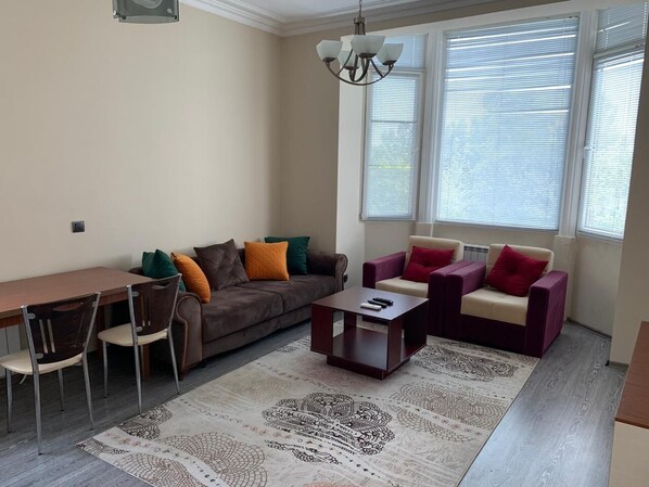Apartment, 1 Bedroom | Living area | Flat-screen TV - Sea View Apartment in the Old City (Baku)
