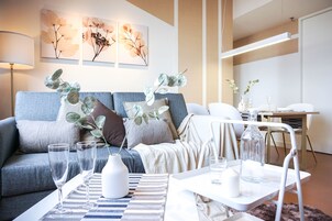 Superior Suite | Living area | 43-inch LED TV with digital channels, TV, streaming services