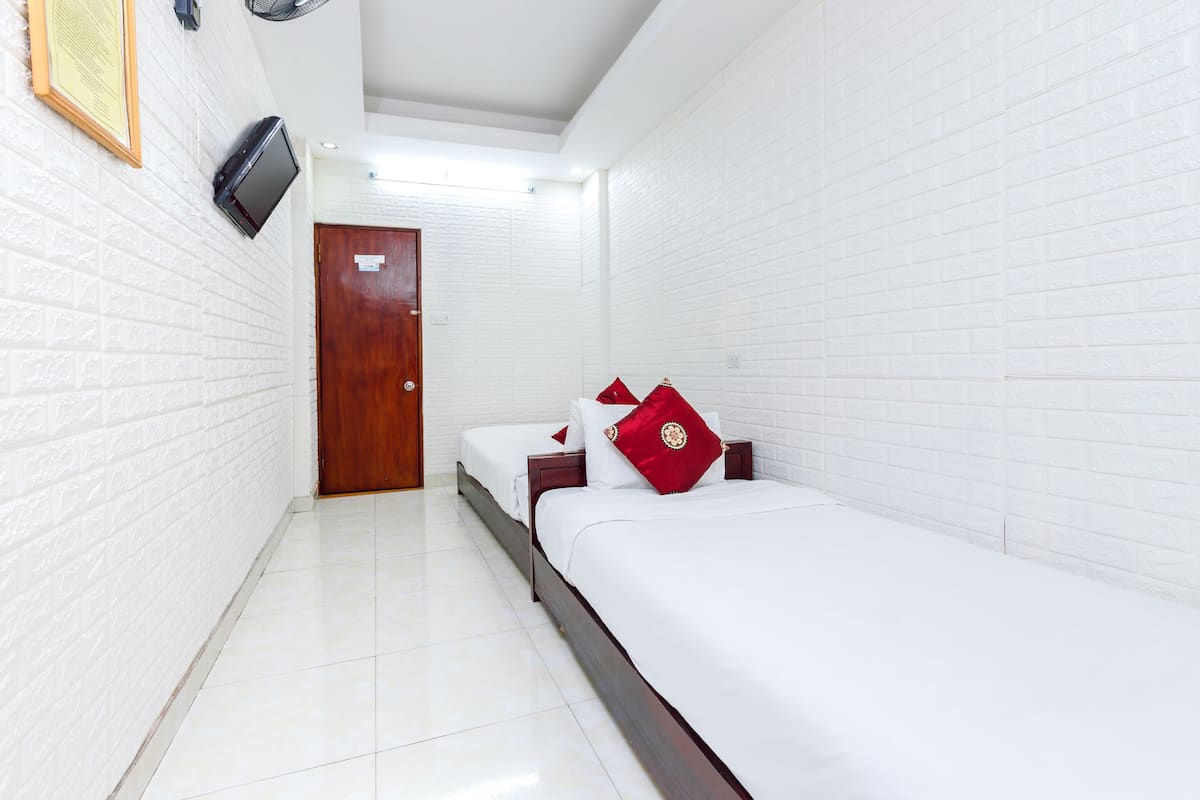 Standaard Twin kamer (Spot on) | Geluiddichte muren, gratis wifi, beddengoed