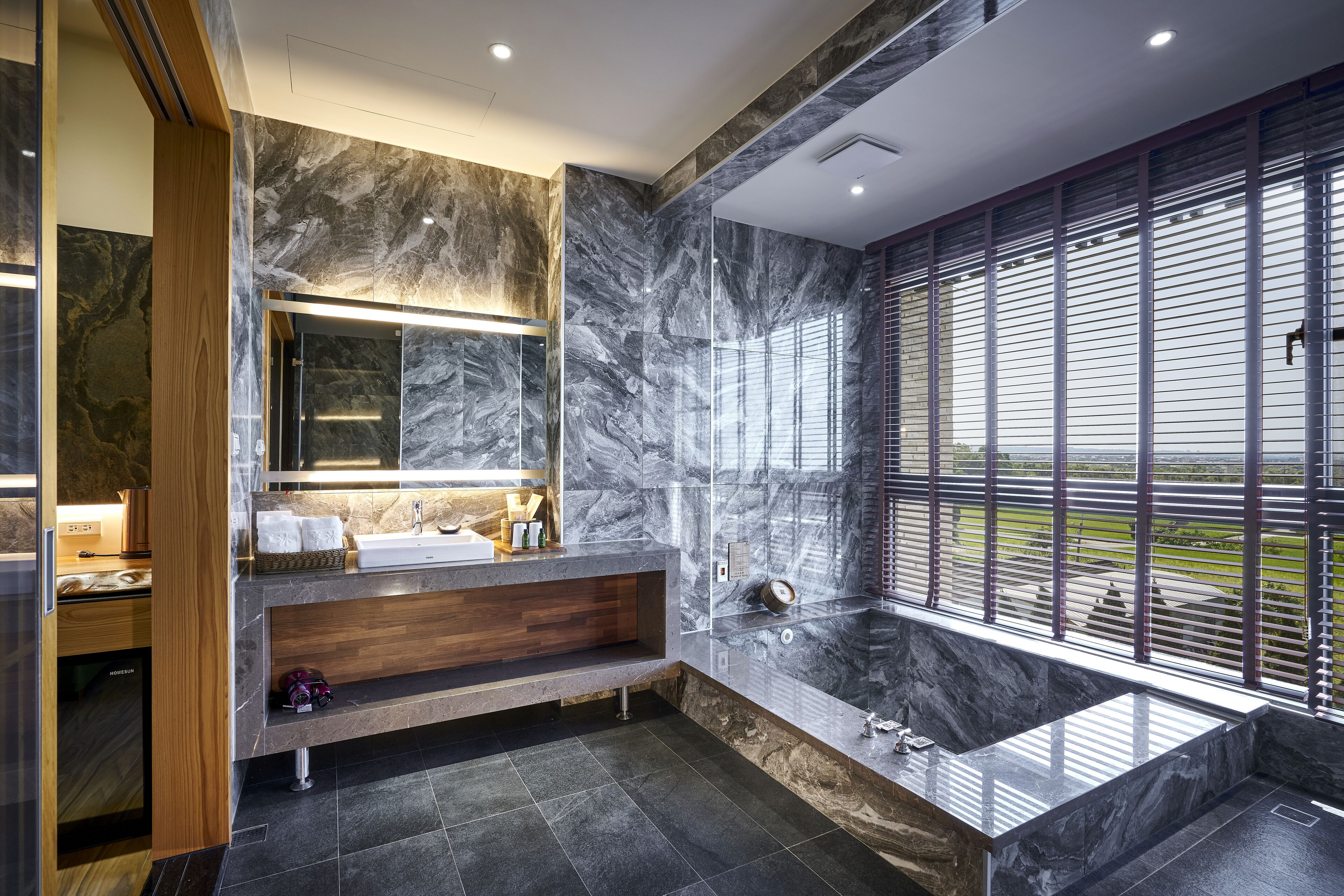 deluxe double room | bathroom | separate bathtub and shower, spring water bathtub, hair dryer, bathrobes