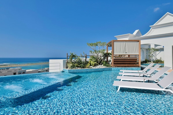 Seasonal outdoor pool, open 8:00 AM to 8:00 PM, lifeguards on site