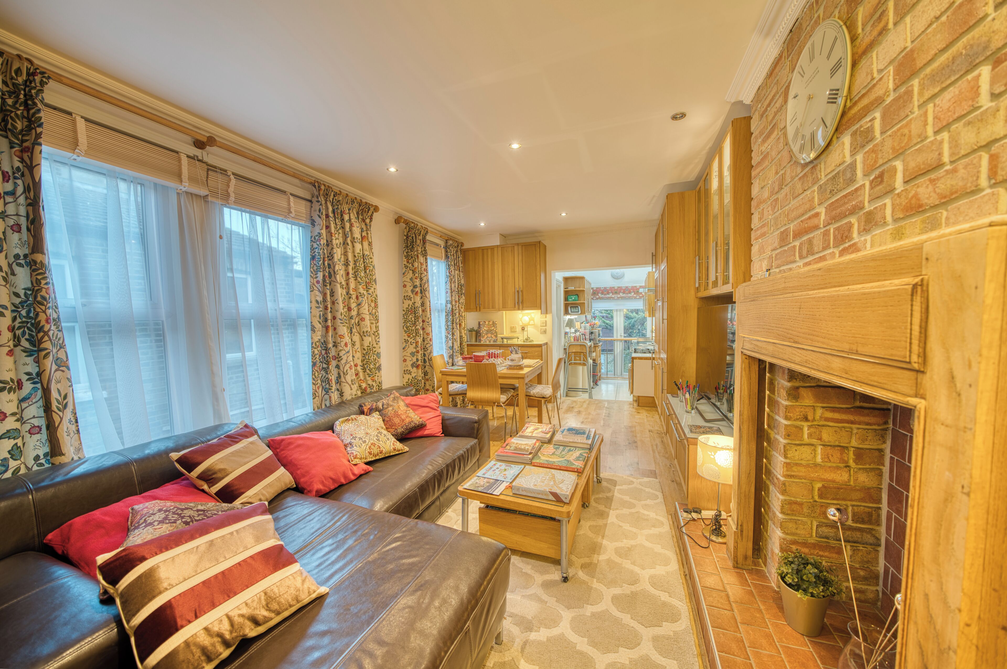 Smart TV, fireplace, books, printers