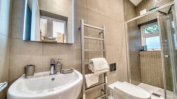 Shower, eco-friendly toiletries, hair dryer, bidet
