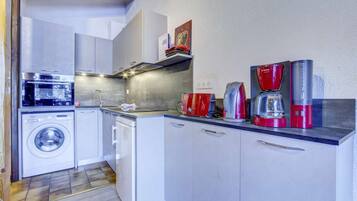 Fridge, toaster, cookware/dishes/utensils
