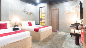 Family Room | Desk, free WiFi - RedDoorz Plus @ Taft North Mandurriao (Iloilo)