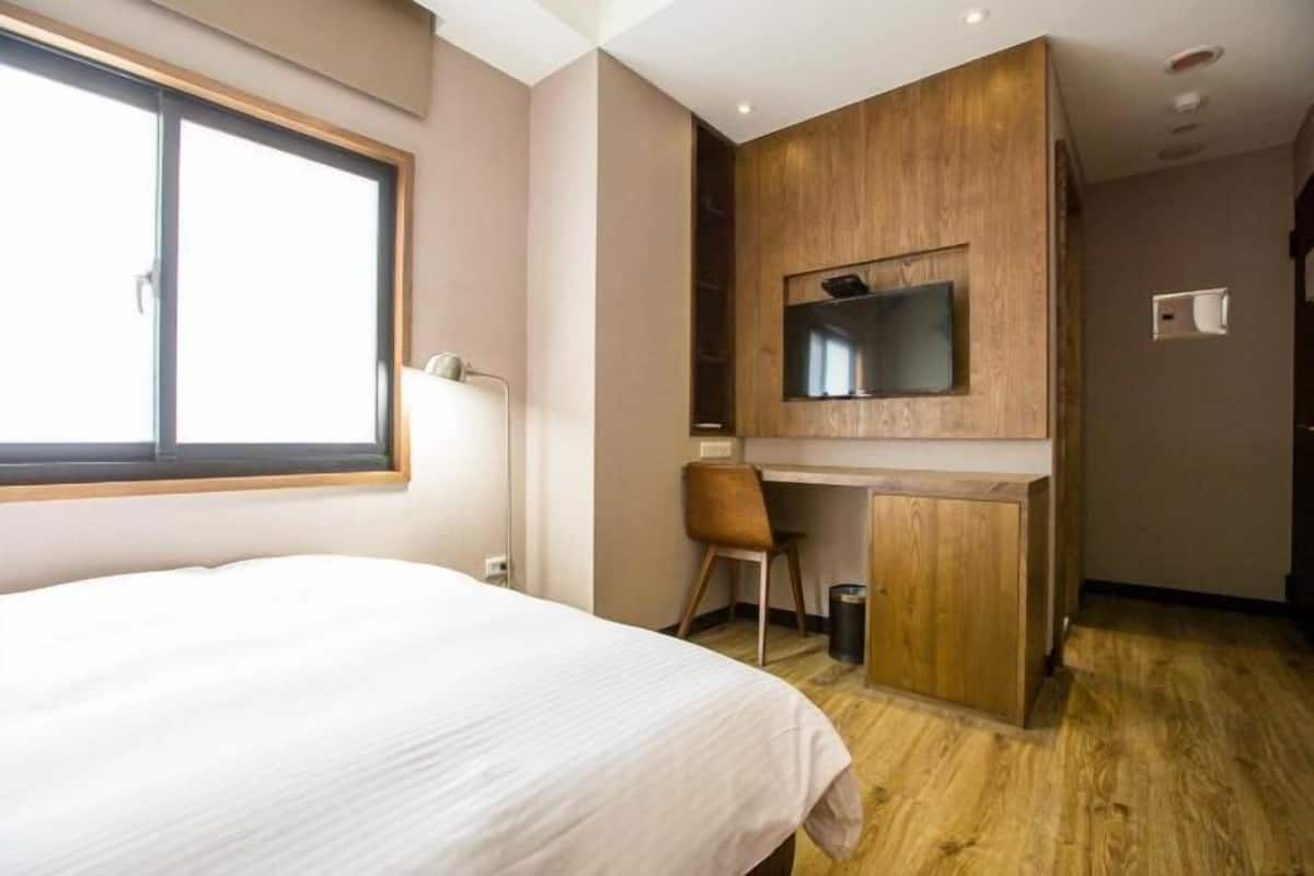 Down comforters, desk, WiFi (free), bed sheets